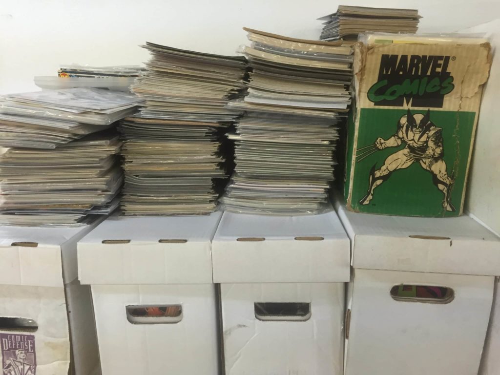 Stack of comic books and comic book short boxes Marvel Wolverine X-Men