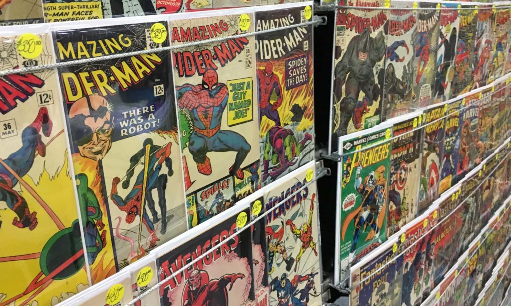 Wall of comic books including Marvel Amazing Spider-Man retro